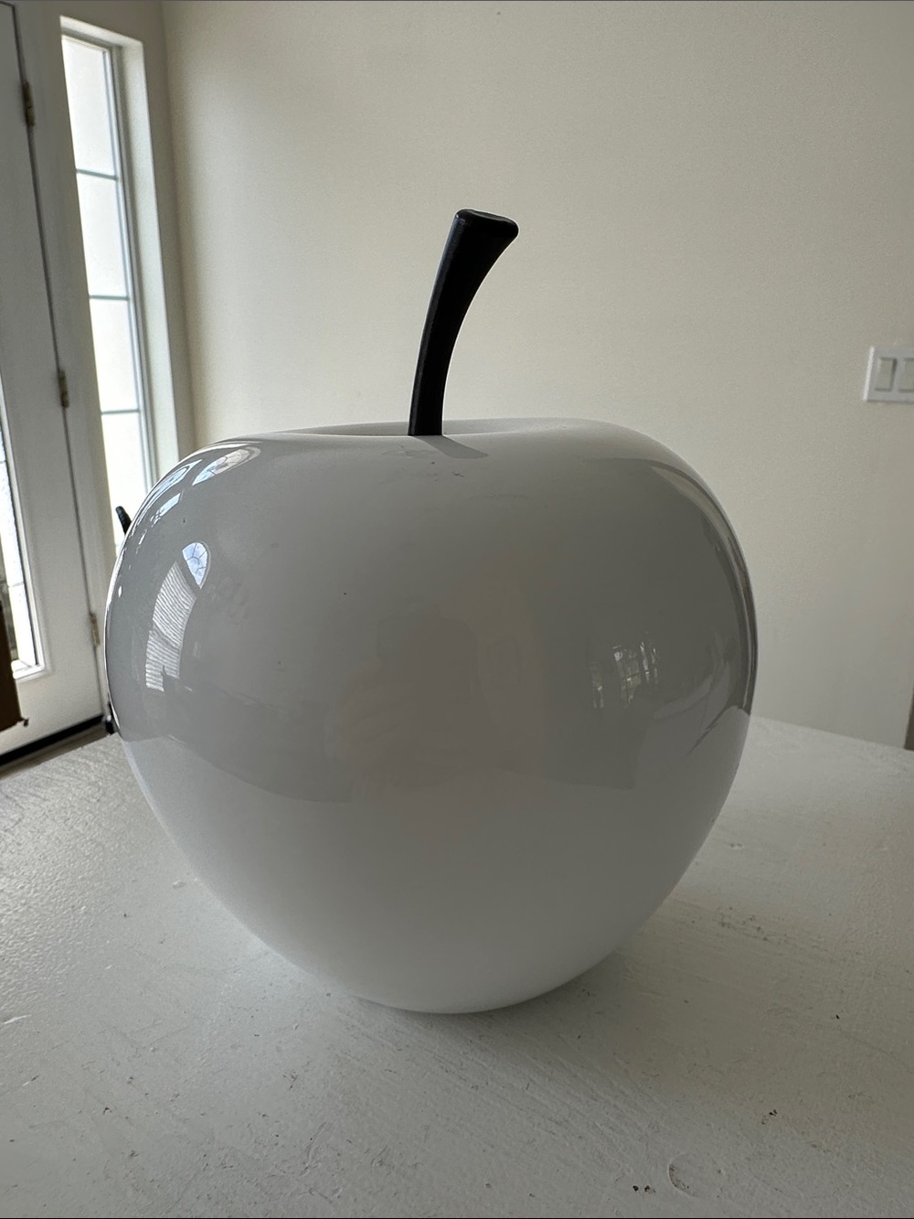 Glossy White Apple Sculpture with Black Stem